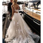 Tulle Spaghetti Strap Backless Wedding Dresses with V Neck in Long A-Line Style