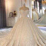 Ball Gown with Sweetheart Neckline featuring Lace Beading and Sleeves