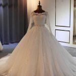 Ball Gown with Sweetheart Neckline and Tulle Lace adorned with Sleeves