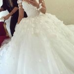 Ball Gown with Sweetheart Neckline and Tulle Fabric featuring Sleeves