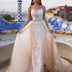 Mermaid Wedding Dress with Jewel Neckline and Beautiful Lace Tulle showcasing a Sweep Brush Train