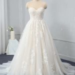 Backless Appliques Lace Tulle A-Line Wedding Dress with Sweetheart Neckline Long Sleeves