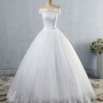 Glamorous Off-The-Shoulder Ball Gown Tulle Wedding Dress with Intricate Lace Embellishments