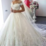 Ivory Tulle Applique Sweep Train Wedding Dress with Elegant Off The Shoulder Design