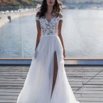 Princess A-line Lace Tulle Wedding Dress in Off Shoulder Style adorned with White Details