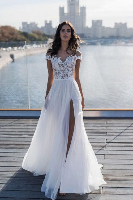 Princess A-line Lace Tulle Wedding Dress in Off Shoulder Style adorned with White Details