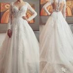 Long Sleeve Court Tulle Wedding Dress with Bateau Neckline featuring Lace Details