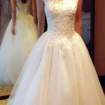 Beaded Cap Sleeve Ivory Lace Tulle Bridal Gown Wedding Dress creating a Princess Look