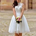 High-Neck Sleeveless Keyhole Knee-Length Lace Tulle Bridal Dress showcasing a Princess Look