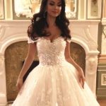 Cathedral Ball Gown Lace Wedding Dress with Sweetheart Neckline showcasing a Princess Look