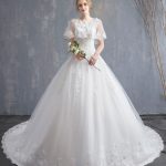 Ball Gown Princess Wedding Dress with Lace Beaded Tulle and Long Train