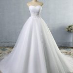 Lace Appliques Ball Gown Wedding Dresses with Sleeveless Bridal Gowns and Sweep Train Strapless Style