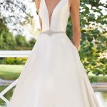 Stunning A-Line Floor Length Sleeveless Beaded V-Neck Backless Satin Fabric Bridal Gown with Train