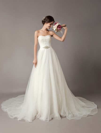 Enchanting Ivory Strapless Lace Beaded Chapel Train Bridal Gown