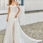 Elegant A-Line Floor-Length Sleeveless Beaded Sweetheart Neck Bridal Gown with Train
