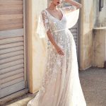 Beautiful White Lace A-Line Wedding Dress with V-Neck and Short Sleeves