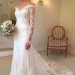 Graceful White Lace Mermaid Beach Wedding Dress with Off-The-Shoulder Sleeves