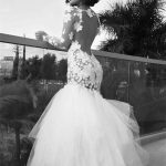 Gorgeous White Tulle Mermaid Bridal Gown with Long Sleeves and Backless Design