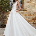 Stunning White V-Neck Sleeveless Satin Fabric A-Line Wedding Dress with Train and Pockets