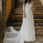 Romantic White Lace Chiffon A-Line Bridal Gown with Jewel Neck and Backless Design