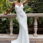 Elegant White Mermaid Bridal Gown with Brush Train and Strapless Design