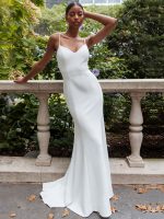 Elegant White Mermaid Bridal Gown with Brush Train and Strapless Design