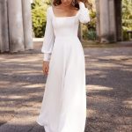 Graceful White Polyester Sheath Floor-Length Bridal Dress with Designed Neckline and Bows