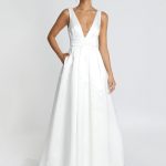 Vintage White A-Line Bridal Dress with Backless Design and V-Neck Sleeveless