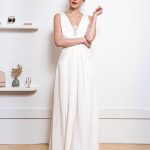 Elegant White A-Line Bridal Dress with Backless Design and V-Neck Sleeveless