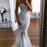 Timeless White Tulle Crew Neck Wedding Dress with Sheer Long Sleeves and Lace Details