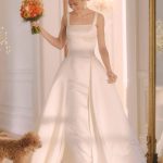 Graceful White Floor-Length Bridal Gown with Applique Illusion Neckline and Sleeveless Design