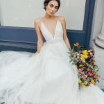 Exquisite White A-Line Floor-Length Bridal Dress with Applique V-Neck and Sleeveless Design