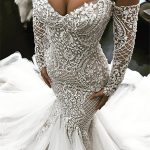Wholesale Classic Off-The-Shoulder Lace Bridal Gown with Fit and Flare Silhouette and Long Sleeves